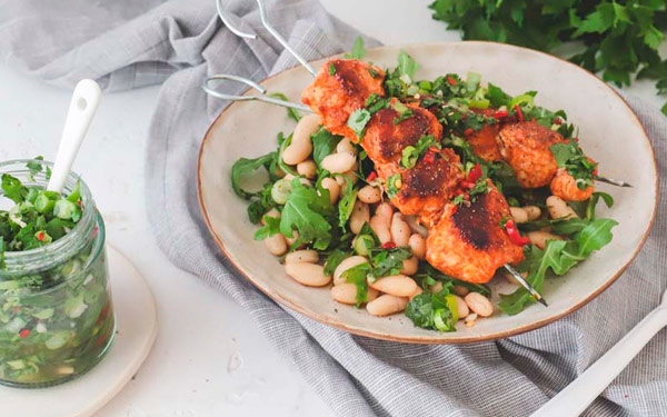 Chimichurri chicken skewers and white bean salad