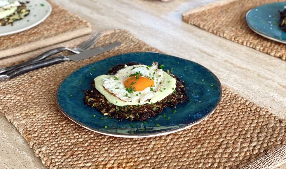 Gluten free zucchini fritters with a sunny side up egg