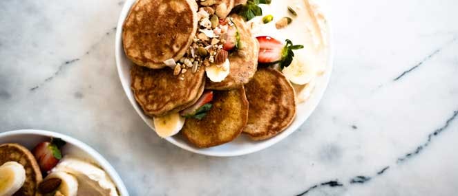 Mini multigrain pancakes with berries and yoghurt